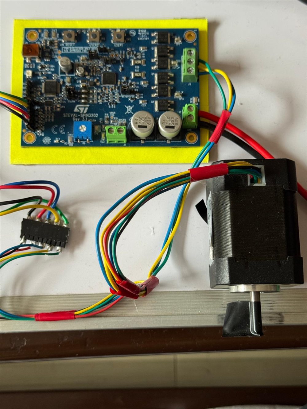 The development board and the BLDC motor on the bench